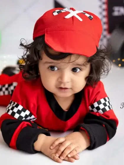 A close-up of our adorable racer. Look at those beautiful eyes and curly hair! I love capturing these detailed portraits.