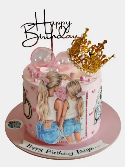 A sweet birthday cake featuring a "best friends" illustration and a golden crown. The bubble-like spheres add a fun, modern touch.