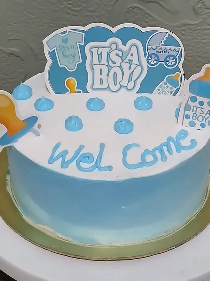 A simple "It's a Boy" cake to welcome a new baby.