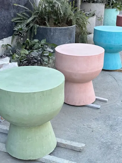 Our concrete seating benches are available in a range of custom colors and terrazzo finishes. Perfect for adding a pop of color and durable seating to your outdoor garden, patio, or indoor space.