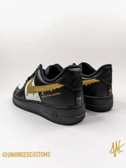 The back view of the Budweiser AF1s, showing the tagline and personalized initials for each employee.