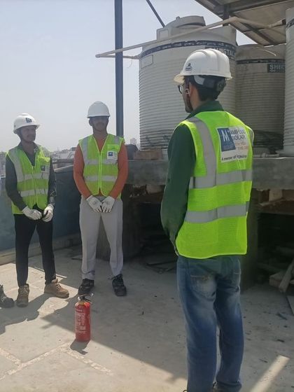 A safety instructor briefs the HomeScape team before a fire safety drill. These sessions are part of our standard operating procedures to ensure the highest level of safety for both our teams and our customers.