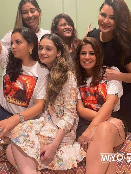 The girl gang supporting their friend's movie release in matching custom Brahmastra t-shirts.