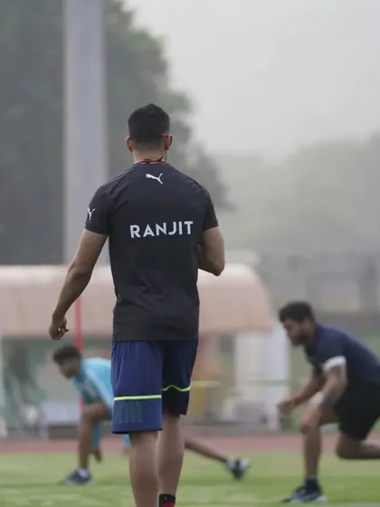 My view from the field during a foggy morning training session. The work never stops.