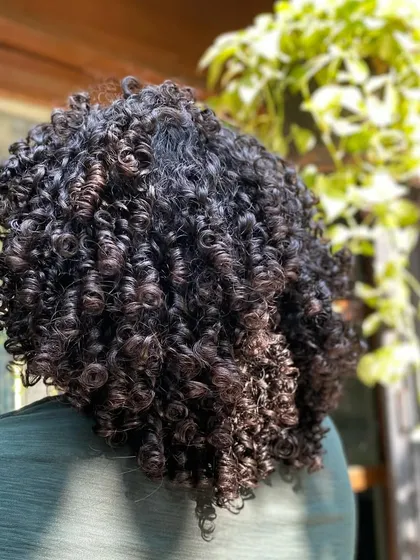 This is what I call hair goals for men. These luscious, defined curls are the result of a great haircut and a simple styling routine.