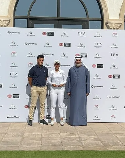 Mahreen Bhatia receives her award at the prestigious Yas Links Golf Course after a successful tournament.