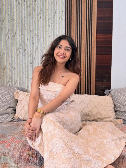 A simple yet stunning strapless lace dress. The delicate fabric and classic silhouette make it a timeless addition to any wardrobe.