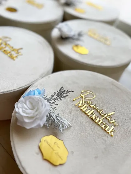 My premium velvet Ramadan gift boxes are designed to impress. The gold acrylic "Ramadan Mubarak" sign adds a touch of luxury.