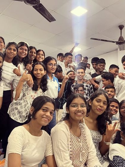 Another lovely group photo showing the camaraderie among our students during the white-themed first day of Navratri.