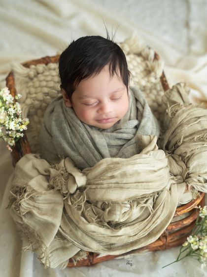 A sweet, sleepy smirk makes this portrait even more charming. Capturing these little expressions is what makes each session unique.