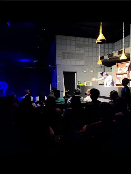 A dimly lit shot of the audience watching a student performance, capturing the intimate and focused atmosphere of our theatre.