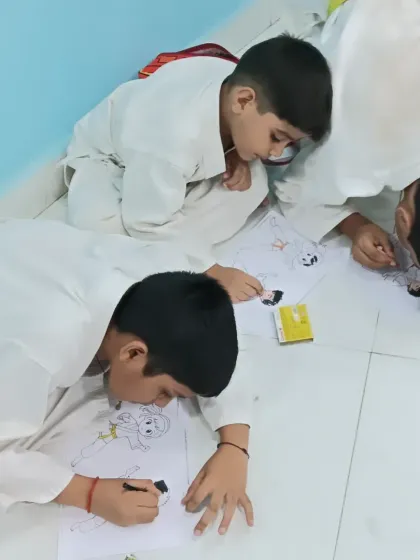 My students completely absorbed in their coloring. These moments of calm focus are just as important as our active training.