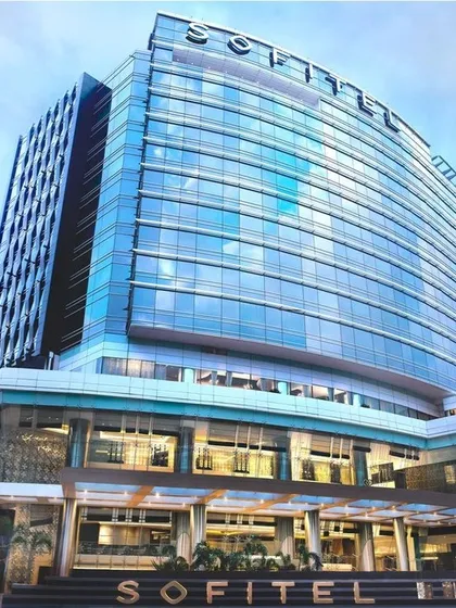 The striking glass facade of the Sofitel hotel in Mumbai's Bandra-Kurla Complex, a 5-star project that showcases our expertise in creating opulent, large-scale urban hospitality landmarks.