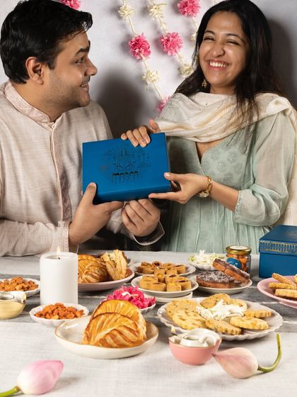 A happy moment of gifting our Meetha Maska Diwali box. The joy of giving is a huge part of the festival for us.