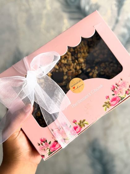 My Walnut Brownies, beautifully packaged in a floral pink box with a delicate ribbon. This makes for a perfect gift for any occasion.