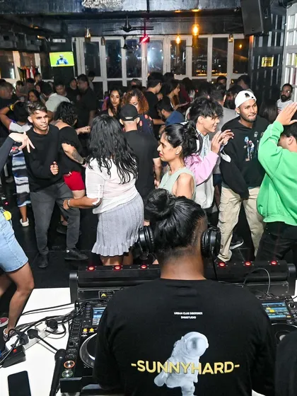 This is my office view. A packed dance floor is the only goal. I read the room and drop the beats that keep everyone moving from start to finish.