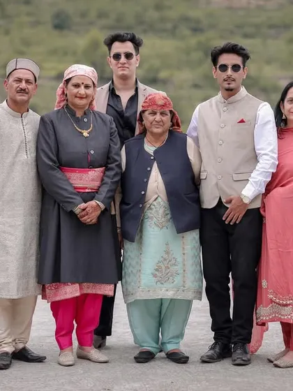 Another wonderful family portrait, showcasing the beautiful traditional attire and the strong family bonds at a Pahadi wedding.
