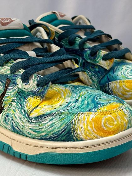 A close-up of the toe box of the "Starry Night" Dunks. The swirling patterns of the sky are so mesmerizing to look at.