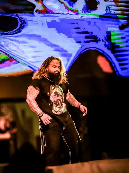 Our frontman owning the stage, fueled by the energy of the crowd. This is where we come alive.
