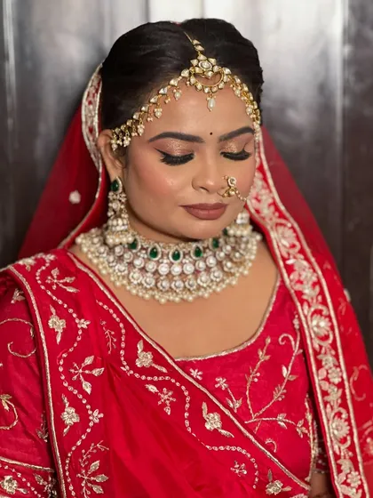 A detailed shot of the makeup, showing the flawless base and the beautiful contouring.