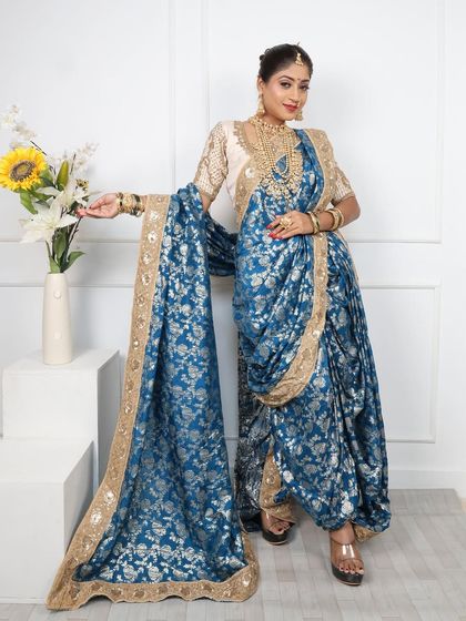 The full-length view of the blue Nauvari shows its grandeur and style.