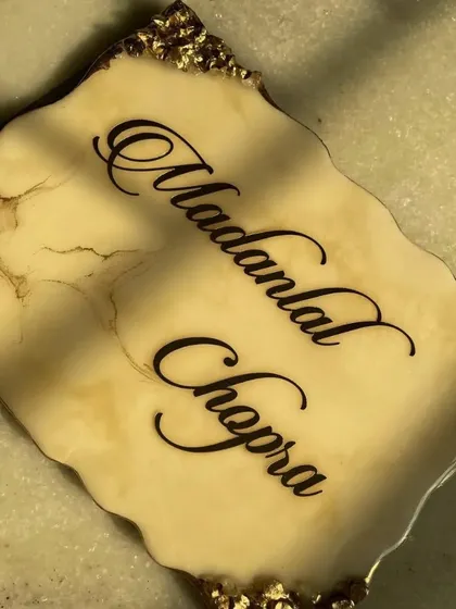 These videos show the creation and final look of my custom resin nameplates. Each one is handcrafted to match the client's vision, providing a unique and personal touch to their home or office.