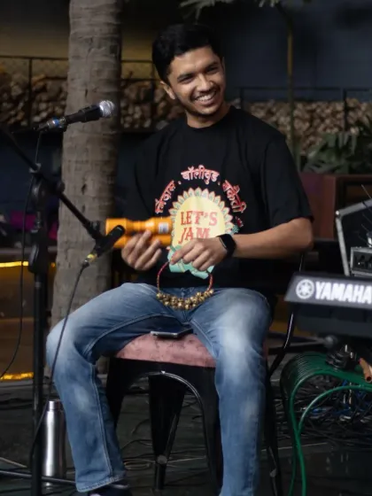 Adding some rhythm with ghungroos and a shaker. We love incorporating diverse percussion instruments to enhance our musical jams.