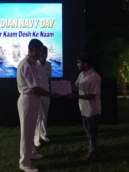 Receiving a certificate of appreciation from the Indian Navy for my participation and work at the INS Hamla painting workshop. It's rewarding to be recognized for contributing to such important events.