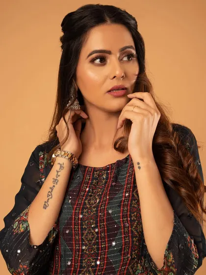 A portrait that shows off the ethnic wear and the model's personal style.
