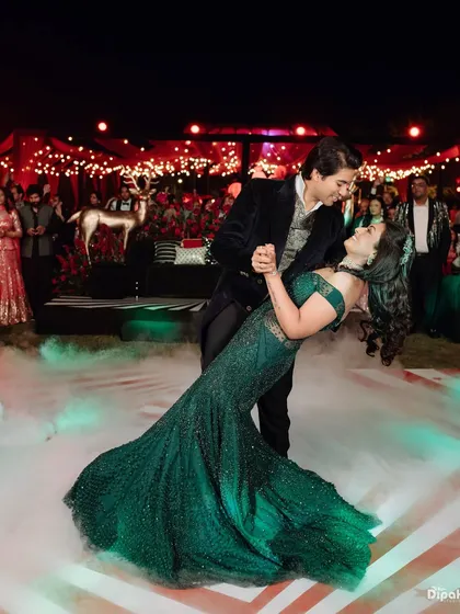 The Sangeet night is for celebrating your love with rhythm and grace. I capture the peak of the performance, the dip in a dance, where for a moment, the world fades away, leaving just the two of you, lost in the music and the magic of the night.