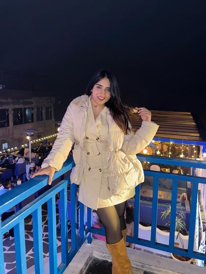 A final shot on the balcony of the cafe. This captures the cozy, winter evening vibe.