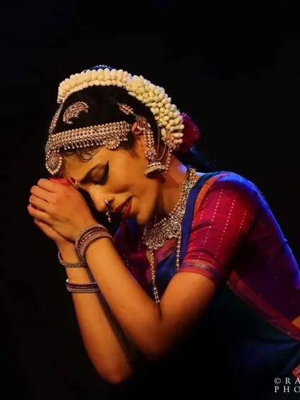 The deep emotion of a gopika, lost in her love for Krishna. Abhinaya, or facial expression, is the soul of Bharatanatyam. In this moment, I am channeling the 'bhakti' and surrender that makes this art form a spiritual experience.