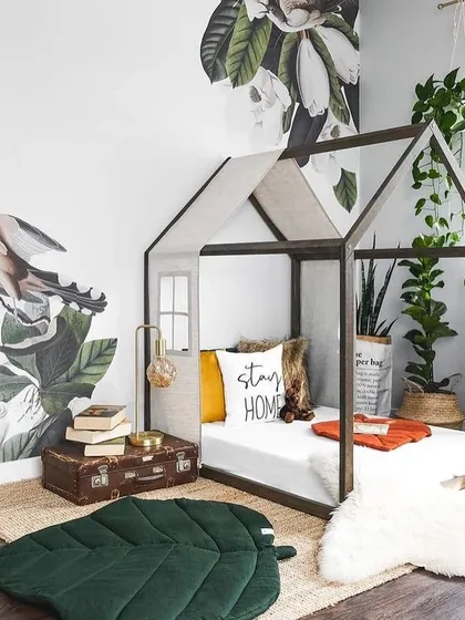 This house-frame floor bed, inspired by Montessori principles, creates a magical and accessible sleeping space. It encourages independence while sparking the imagination with its simple, playful structure.