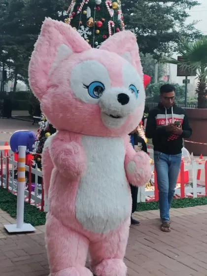 Another view of our pink squirrel mascot, showcasing the high-quality and friendly appearance of our costumes.