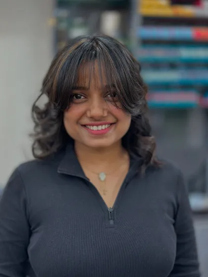 Her smile says it all. The combination of the cut, color, and style has given her a fresh and joyful new look.