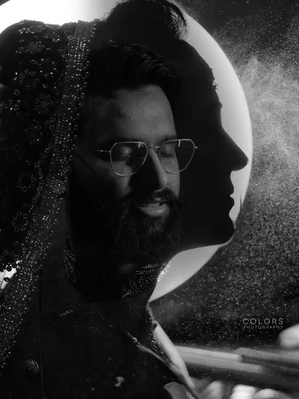 I love playing with light and shadow to create artistic and dramatic portraits. This silhouette shot is an example of how we can create something truly unique and memorable.