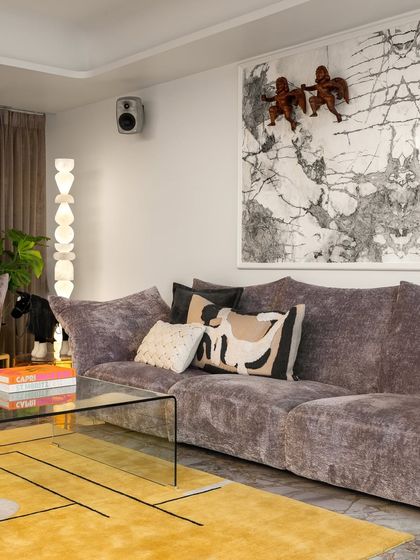 A sanctuary of plush comfort and vibrant whispers. This living space was designed for a special client who is an art collector, crafting a haven where beauty, comfort, and personal expression reside in every detail.