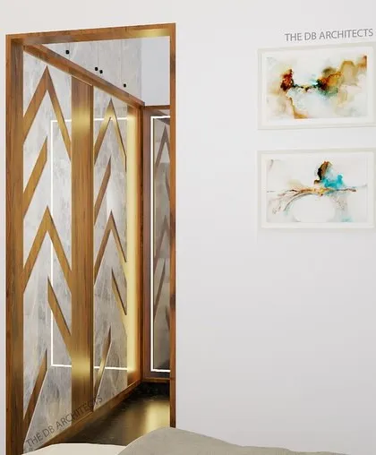 This 3D view shows the walk-in closet area of the master bedroom. The wardrobe doors feature a stylish chevron pattern with brass inlays and integrated lighting, adding a touch of glamour to the storage space.