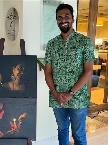 A solo shot with my exhibited paintings at the ITC Gardenia.