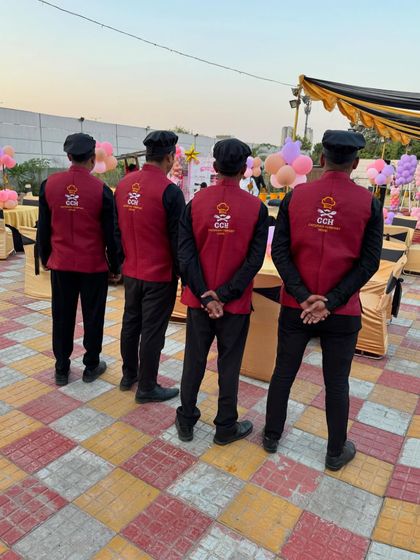 Our team standing ready before the start of a party. We ensure our staff is always prepared and organized to provide the best service.