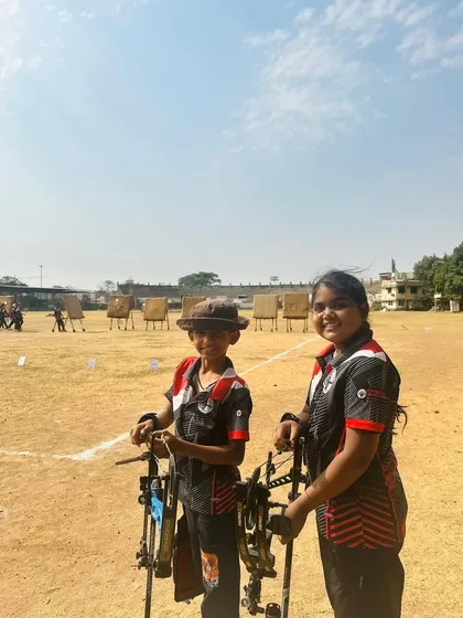 Two of our young archers at the Drona Cup. The friendships formed on the archery field are just as important as the medals won.