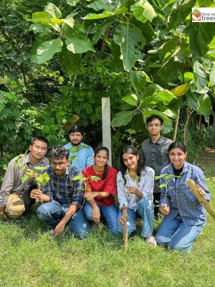 A proud group of Amity University students with the saplings they planted. Each tree is a personal contribution to a greener future and a tangible result of their efforts.