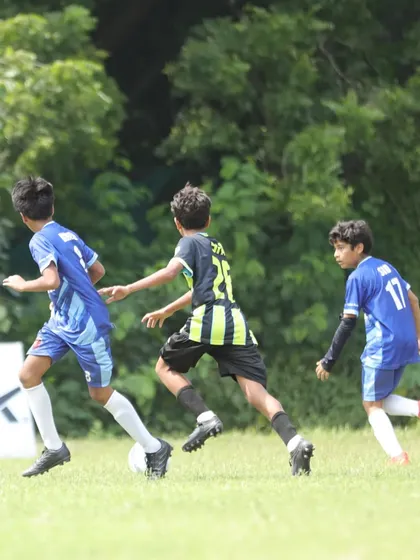 Chasing down every ball. Sidhaan demonstrates his relentless work rate, pursuing an opponent during a match.