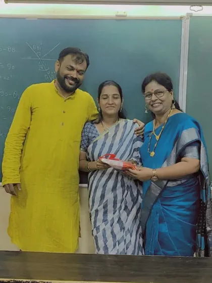 Celebrating Diwali with our faculty. Here, Prof. Parab and a senior teacher present a gift to a staff member, sharing the joy of the festival of lights.