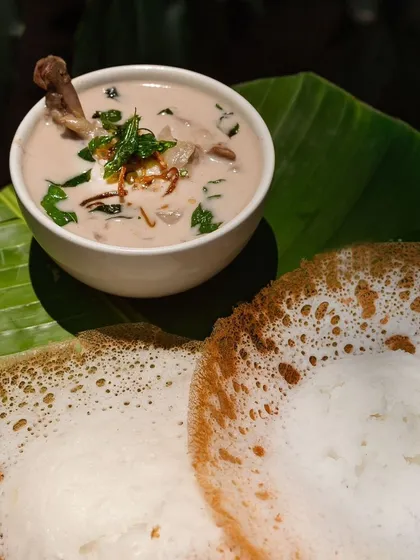 This is pure comfort food for me. My Mutton Stew is rich and fragrant, cooked with potatoes and carrots in a creamy coconut milk base. It’s best enjoyed with my soft, lacey appams, which I make fresh for every order using a batter that I have to babysit just right.