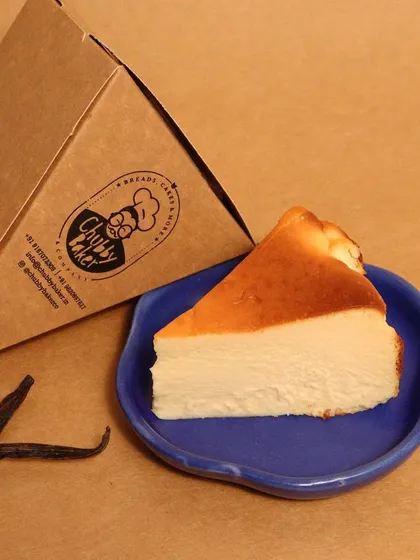 A perfect slice of our Basque Burnt Cheesecake, ready to be devoured. The combination of the creamy center and the beautifully burnt top is what makes it so special.