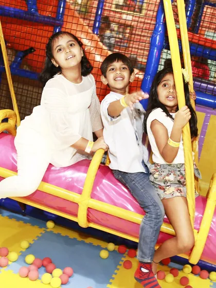 Friends enjoying the ride together in our play maze. Many of our structures are designed for interactive, social play.