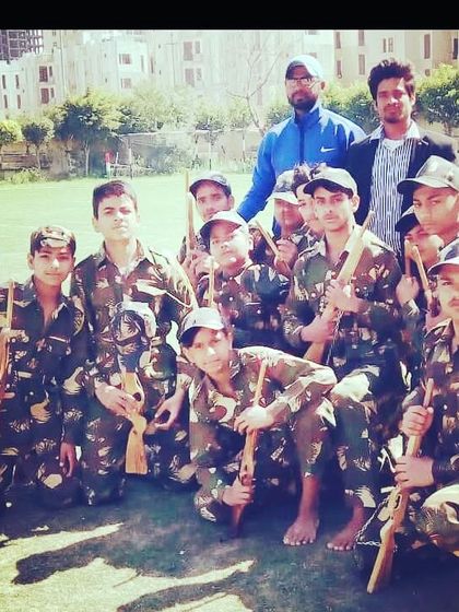 A group of our students dressed in army costumes for a patriotic dance performance. We pay attention to costumes and presentation for a complete act.