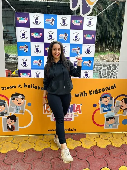 A happy moment after successfully managing the annual day for Kidzonia Preschool. I have extensive experience with school and corporate events, planning shows that are both entertaining and flawlessly executed.