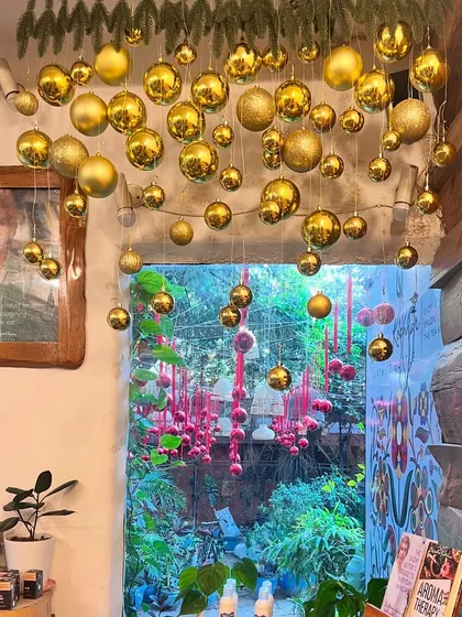 A cascade of golden ornaments brings festive cheer to the salon interior during Christmas, creating a joyful space for your holiday pampering.